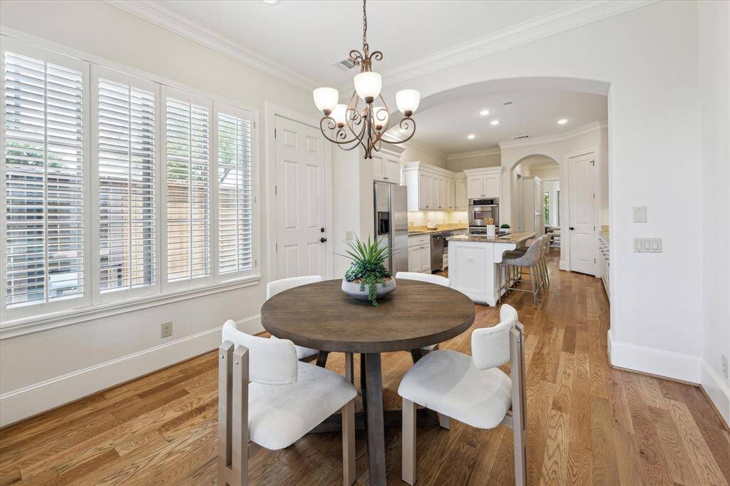 The breakfast room is thoughtfully positioned opposite the kitchen.
