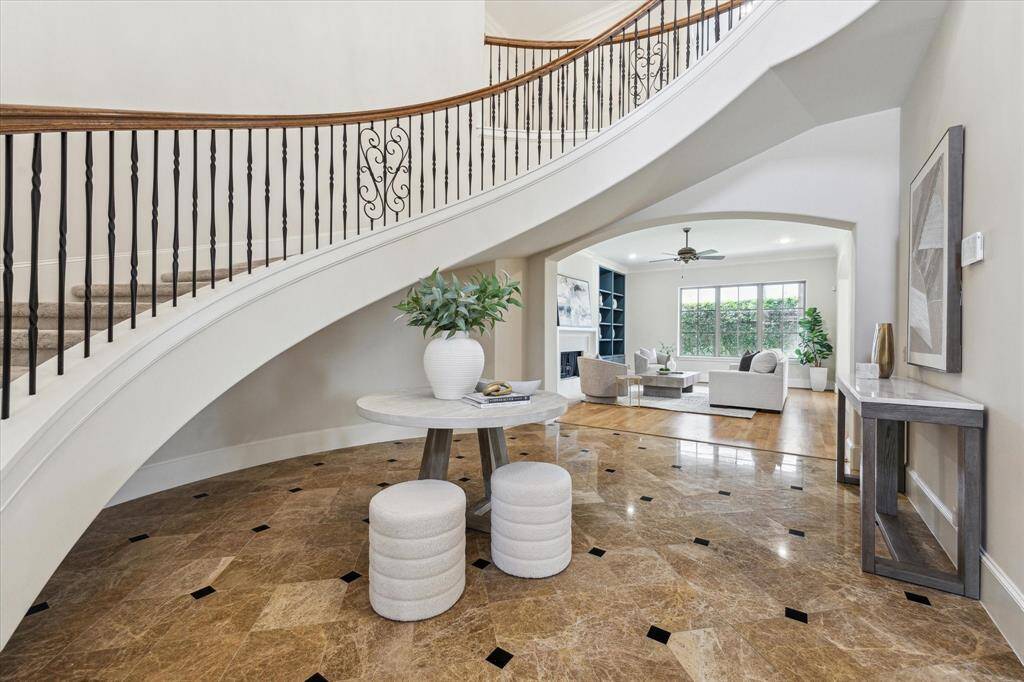 The grand staircase creates a stunning entrance and offers an elegant experience as you walk down it.