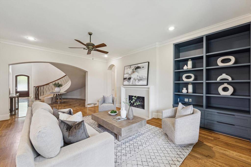 The spacious living room is the perfect gathering place to enjoy time with friends and loved ones.