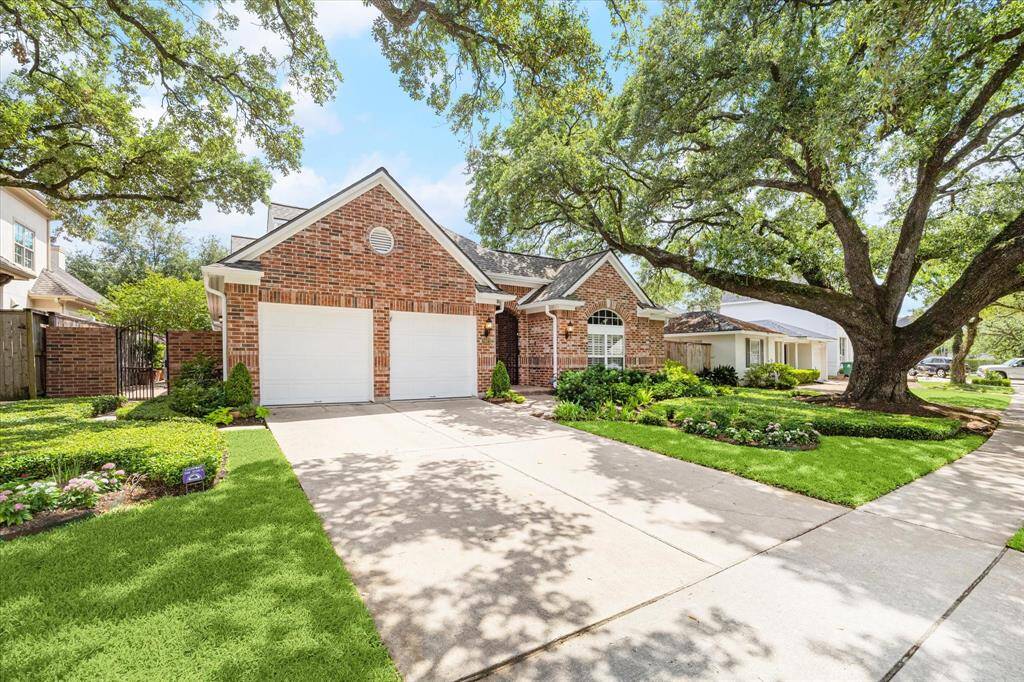 Situated on an 8432 sq.ft. lot (per HCAD), this unique home with its large oak tree gracing the front yard, is a complete surprise upon entering the front gate. It is 2856 sq.ft. of charm.