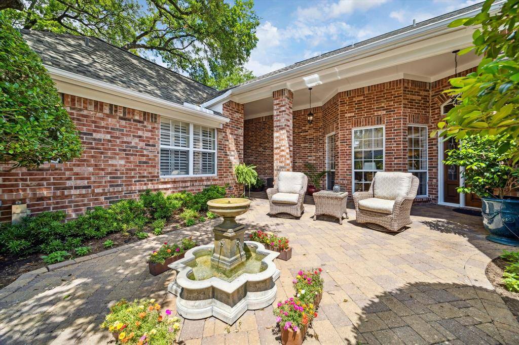 Another view of the front patio. A home tucked away for private,  luxury living.
