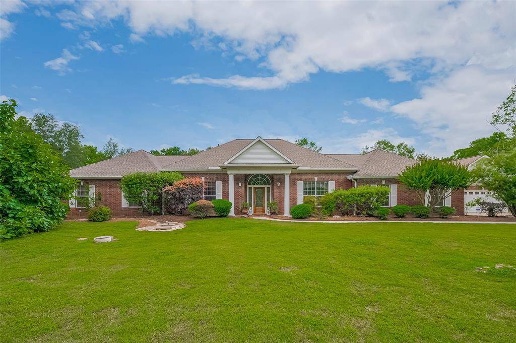 Sprawling brick front elevation, classic pillar entry and recent (2024) roof! Let's go inside and look around!
