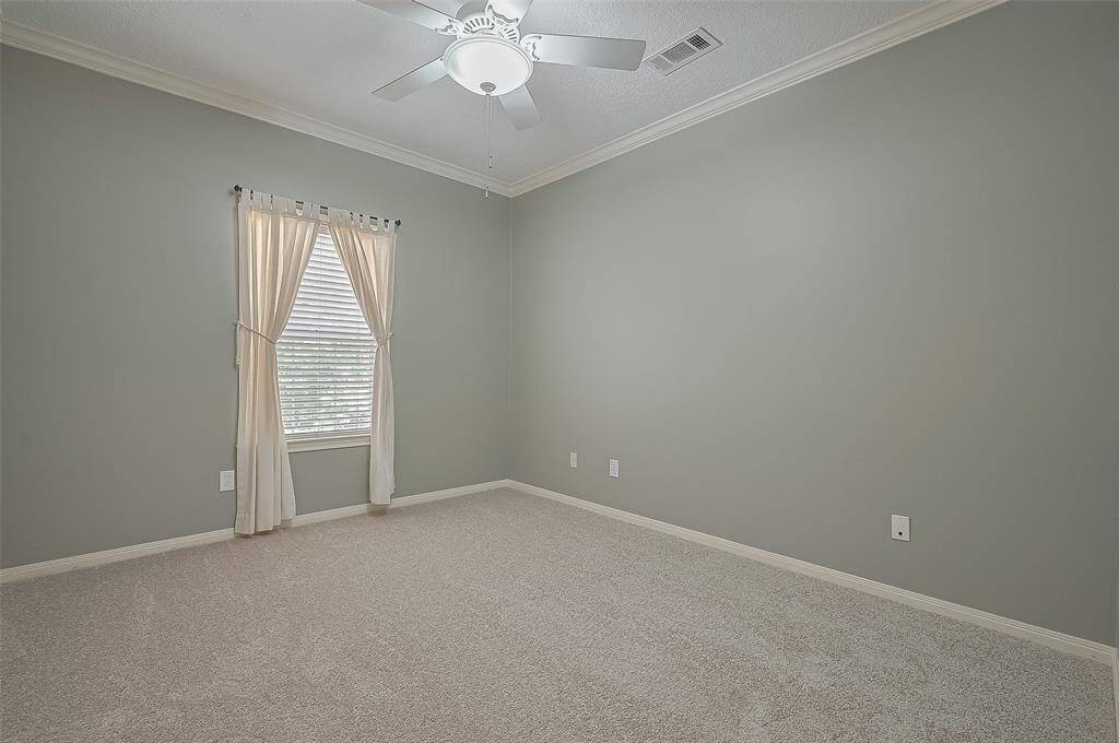 One of the secondary bedrooms with new carpet!