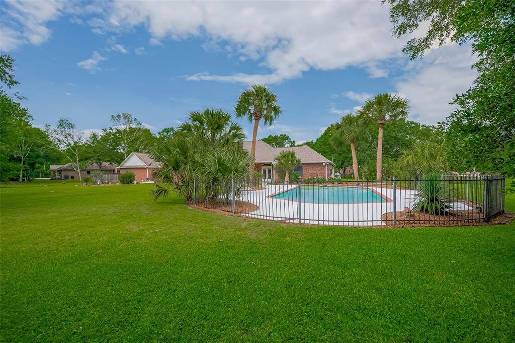 Discover the freedom and space you've been looking for in this expansive backyard — perfect for entertaining, gardening, playtime, or simply relaxing under the open sky. With room to roam and endless potential, this outdoor haven is ready for your vision.