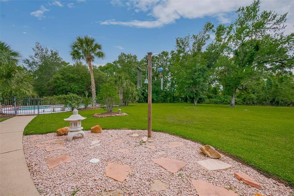Whimsical landscape touches throughout