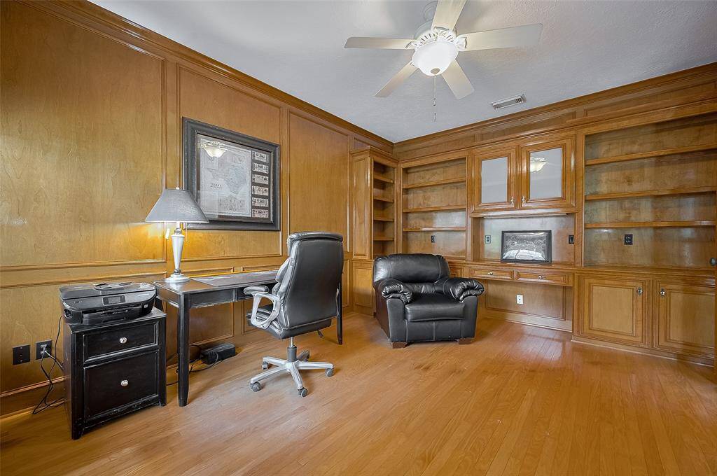 Plus a wall of builtins with optional desk space.  Perfect for remote professionals!