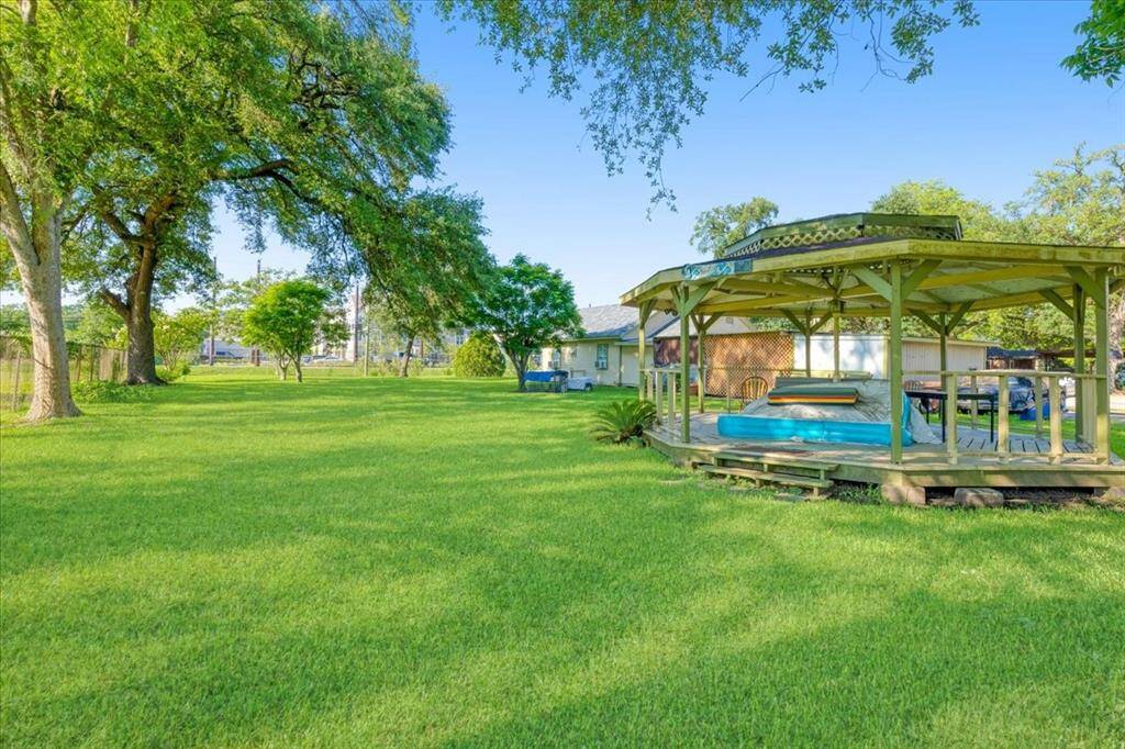 Pretty gazebo on property.