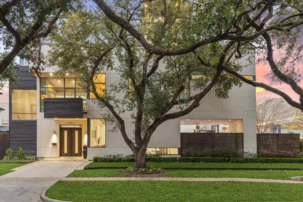 Welcome home! Surrounded by majestic trees offering beauty and privacy