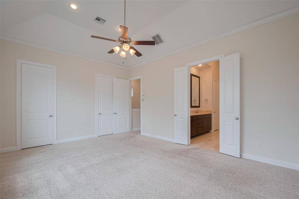 Here you can see the closet doors, entry, and primary bath as well.
