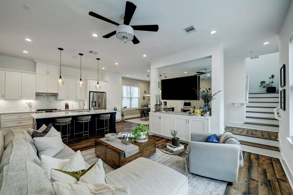 Great view of the second floor from the living room corner, where you can appreciate the expansive space that is thoughtfully divided into activity areas while still being very open.