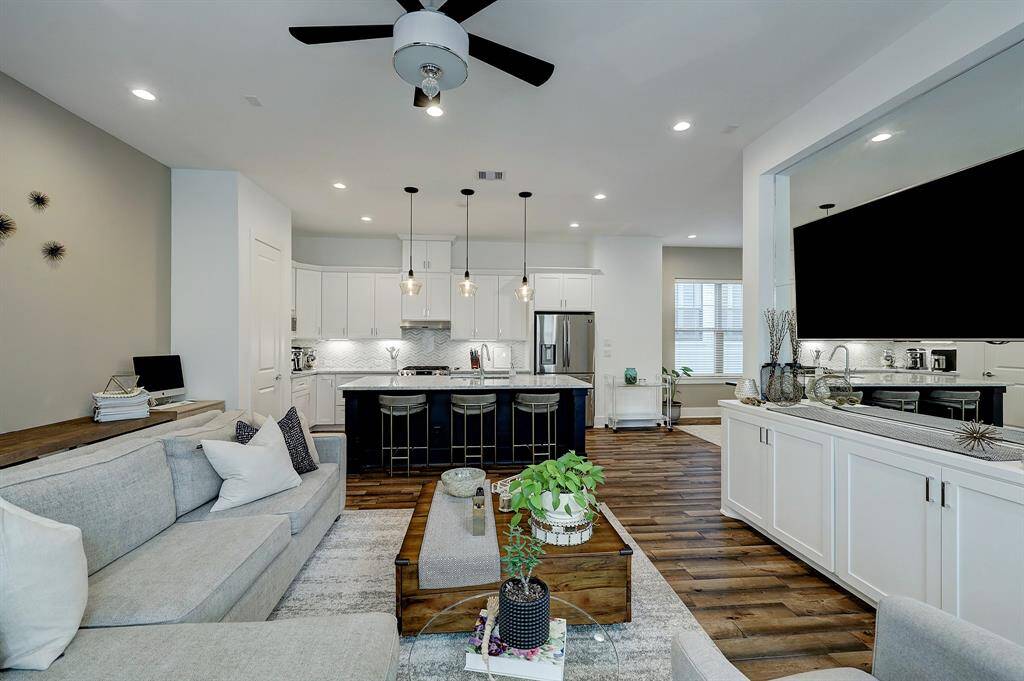 Get ready to host a Super Bowl watch party in this spacious room that flows into the kithen.
