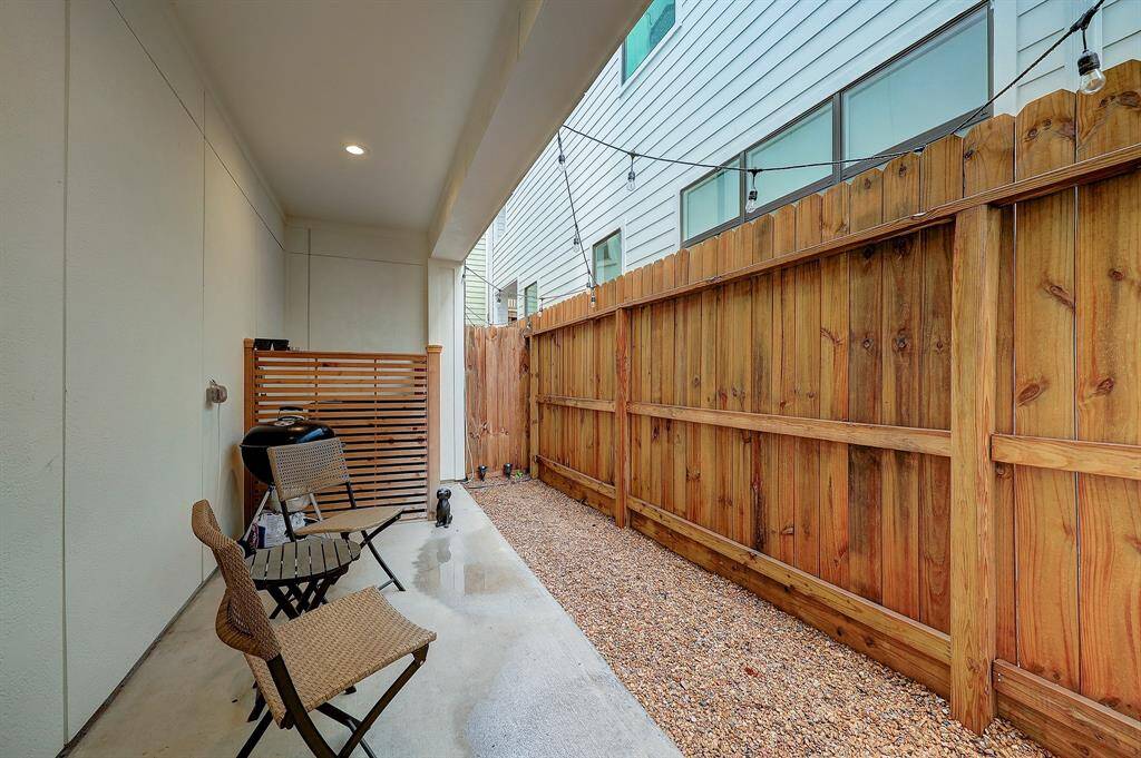 Covered, private patio off the first floor bedroom/flex space is perfect place to enjoy a cup of coffee or set up your grill.