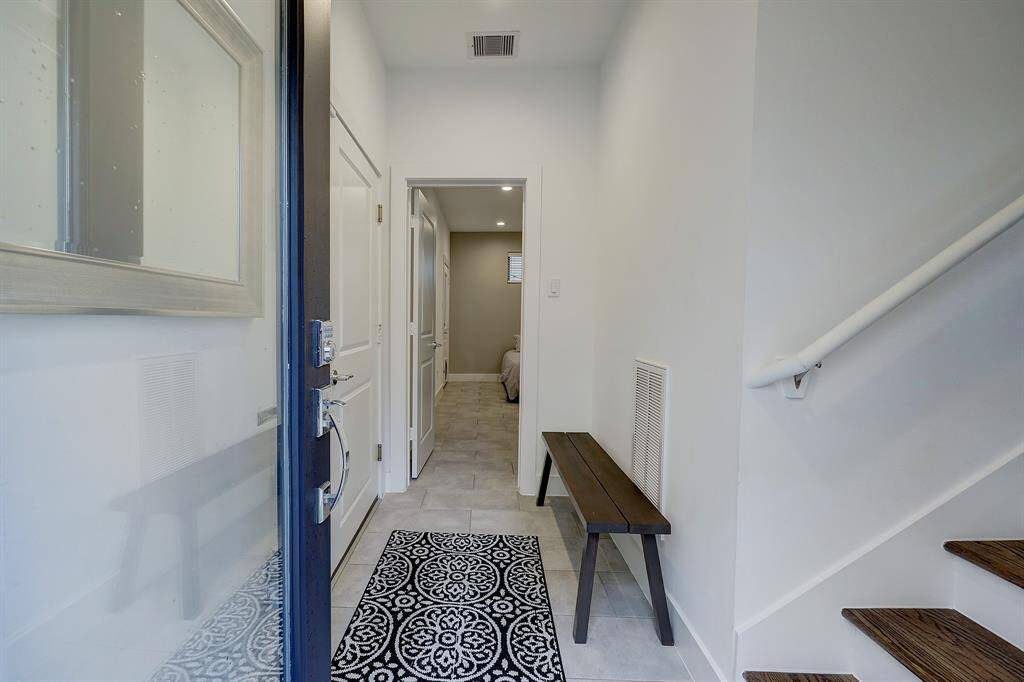 Nice cozy entrance that takes you to the first floor bedroom