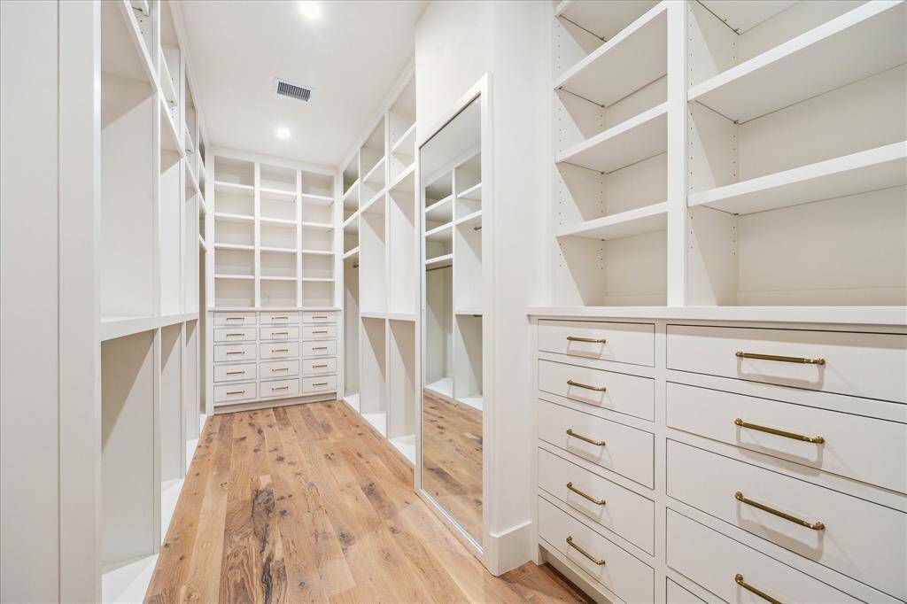 Walk-in pantry complete with microwave and counter space is a chef's dream!
