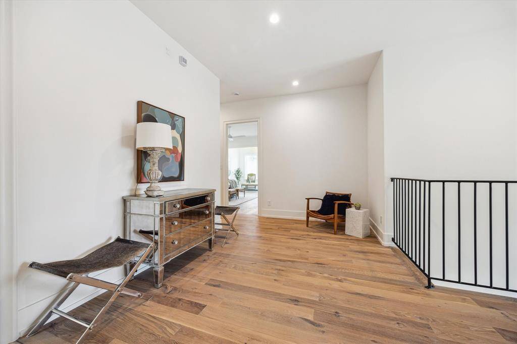 Also located on the first level, off of the back patio is a flex room complete with a full bath and outdoor access.