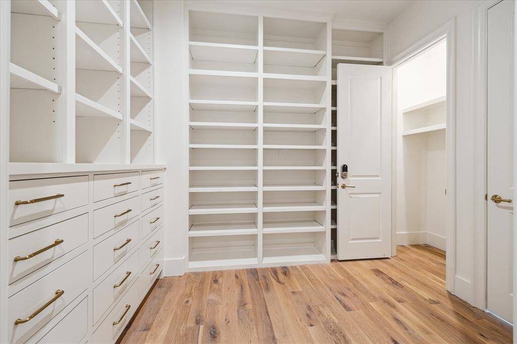 Luxurious primary bathroom complete with large shower, soaking tub, and double vanities.