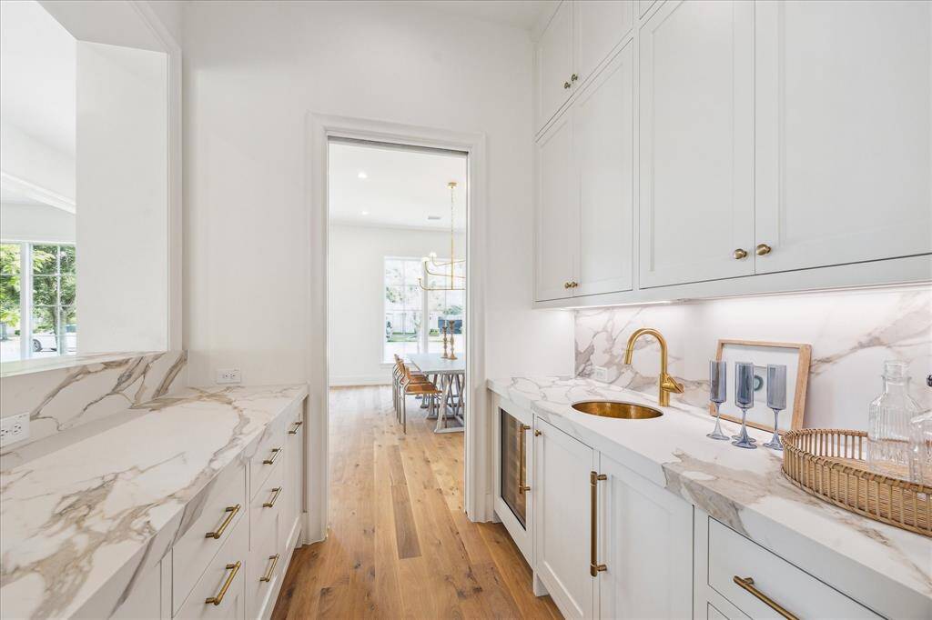 Upon entering the home, you are greeted by hardwood floors thorughout, dining room is on the left and formal living or study on the right.