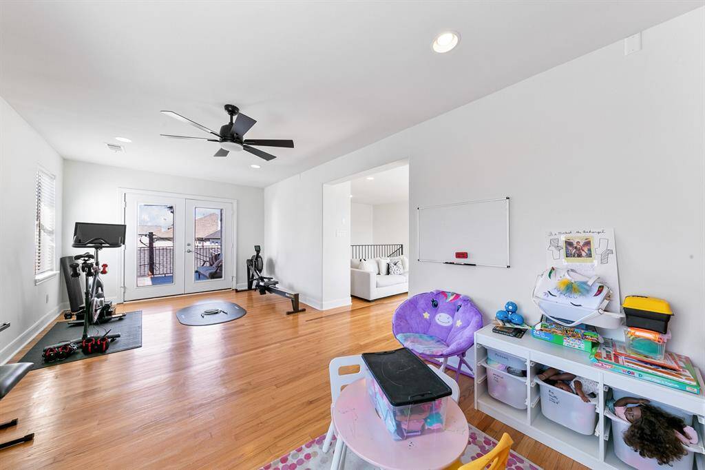 The large game room upstairs opens to the family den as well as the covered porch upstairs.  Current homeowners use the space as a playroom and home gym, as the room is equivalent in size to 2 or 3 bedrooms.