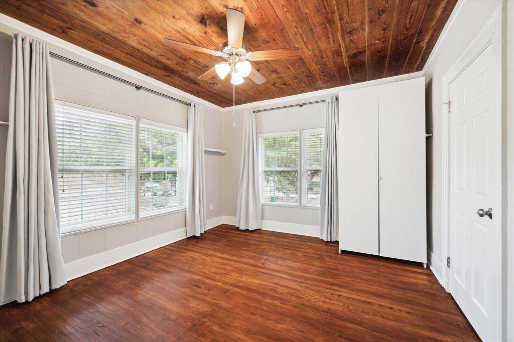 Front bedroom off of the living room with wardrobe closet
