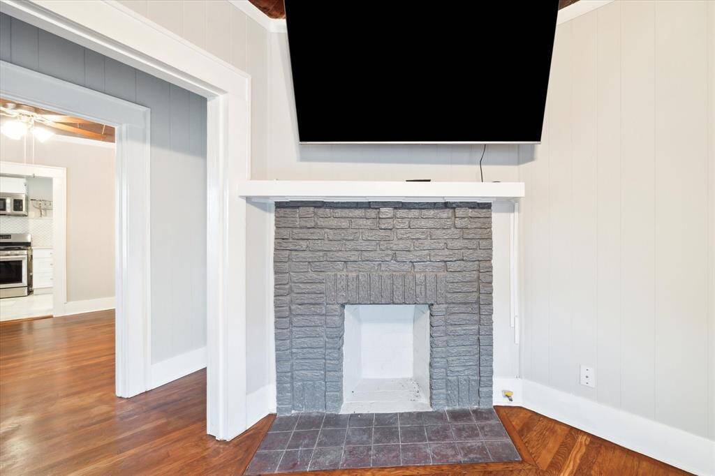 Mock fireplace for charm and aesthetic.