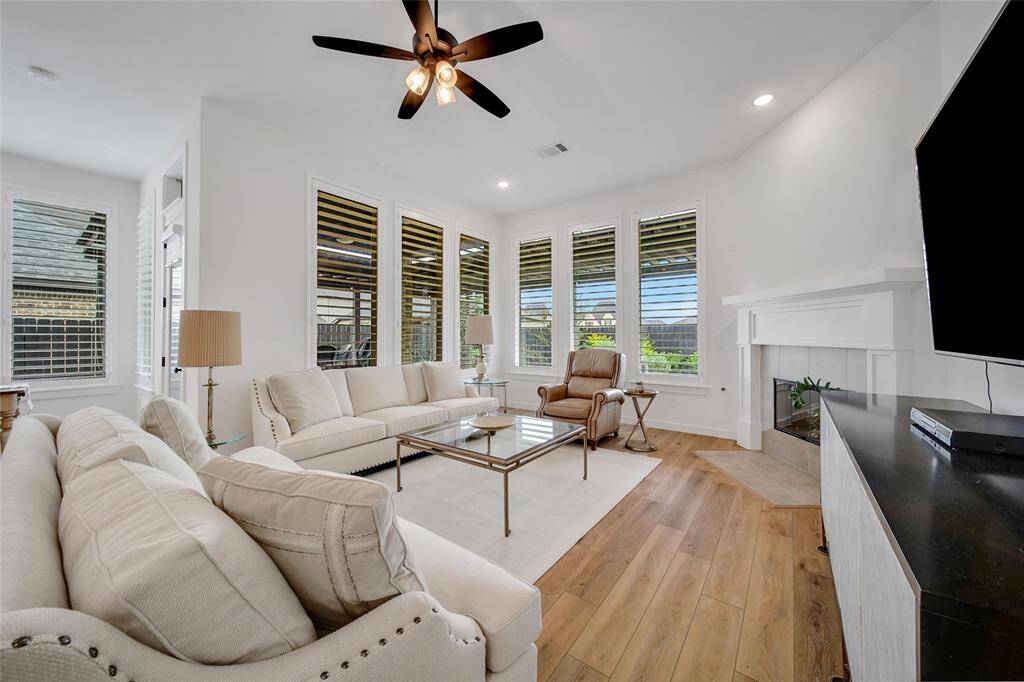Natural light cascades through the windows keeping the room light & bright.