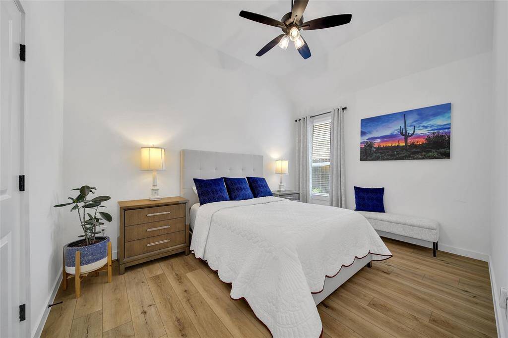 Bedroom 3 is very spacious with conveneint amenities like a ceiling fan and a walk in closet. Each of the bedrooms offer a neutral palette and are ready to be designed by YOU!