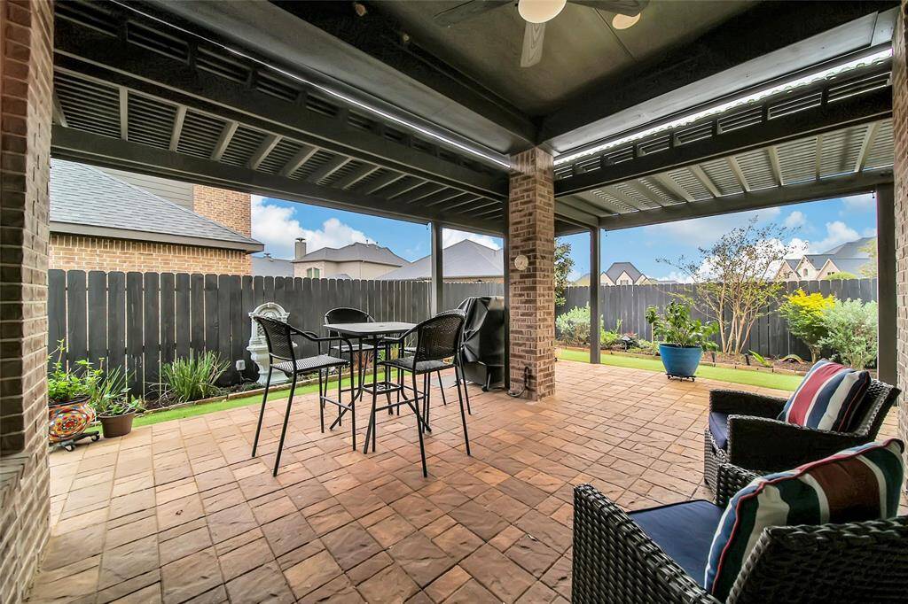The backyard and patio have been transformed to create an enhanced outdoor living experience, perfect for relaxation and dining al fresco. An exterior gas stub has the area ready to add a built in outdoor kitchen in the future.