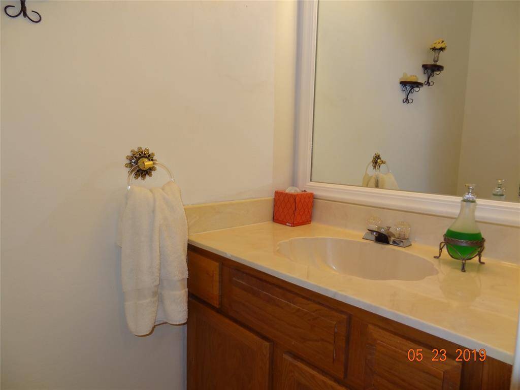 Half Bath downstairs just opposite of entry to kitchen