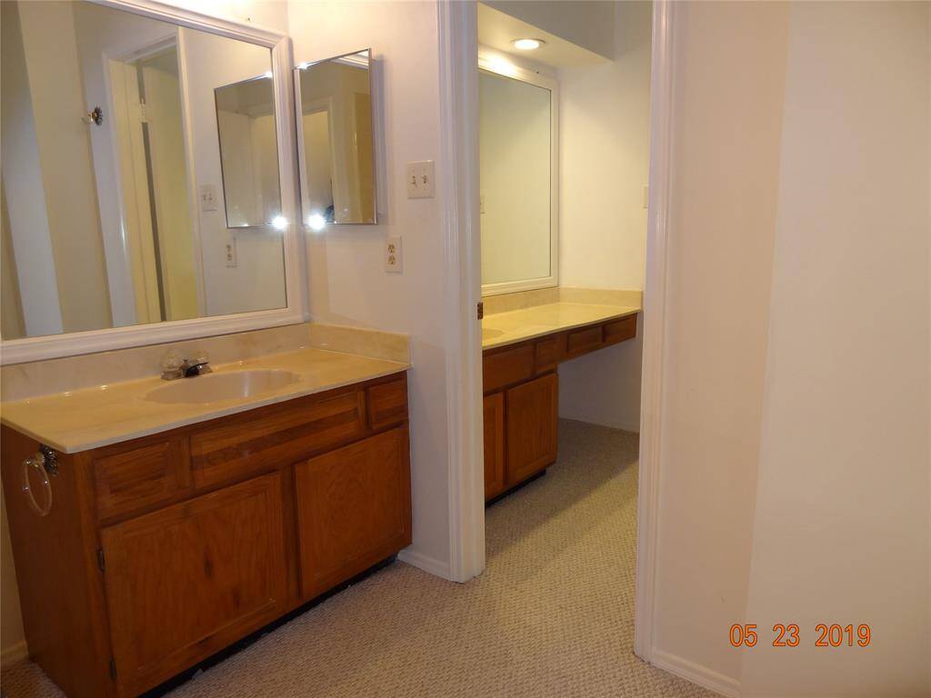 Another view of the double vanities in primary ensuite bath