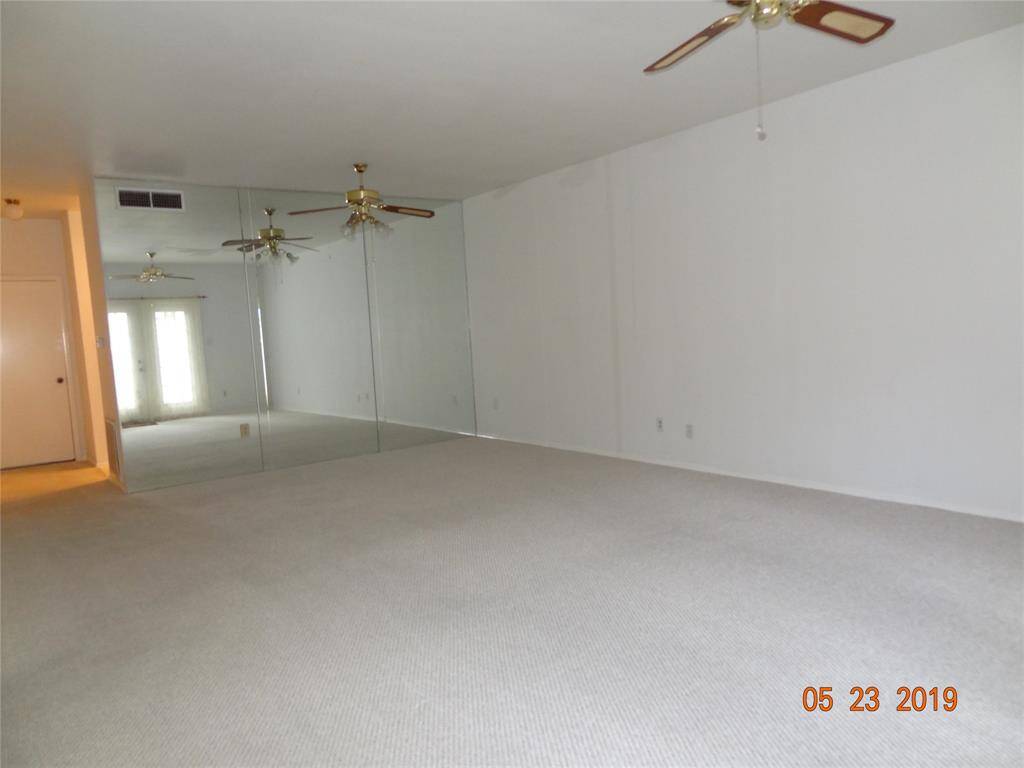 View of Dining area and hallway leading to the kitchen  and Half Bath.