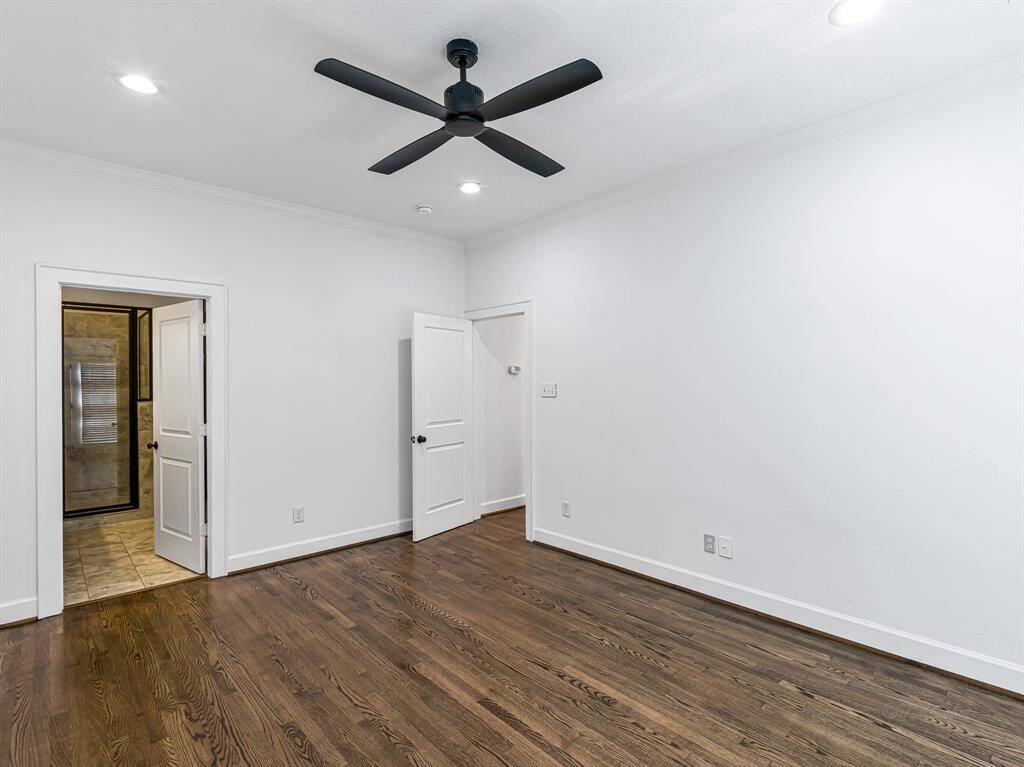 There's ample room for a king-size furniture suite, with the beautifully renovated primary ensuite bathroom just through the door.
