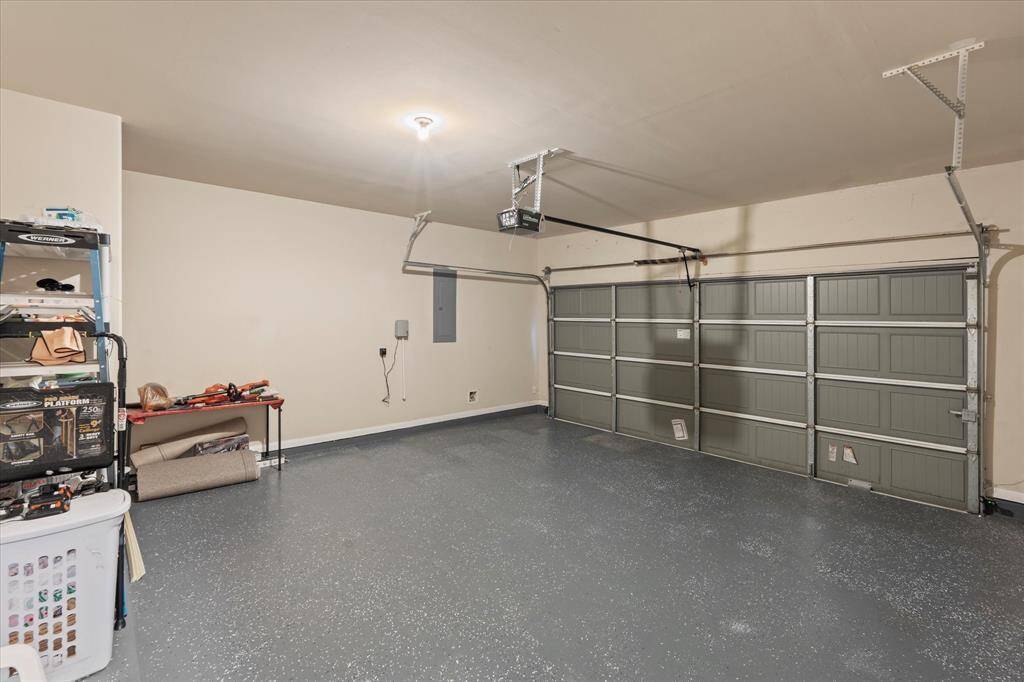 Two car garage with epoxy floors.