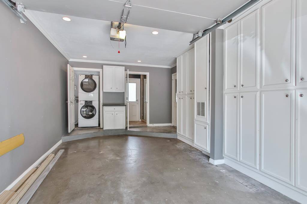 Utility area with tons of storage. This is the location of the second bathroom.