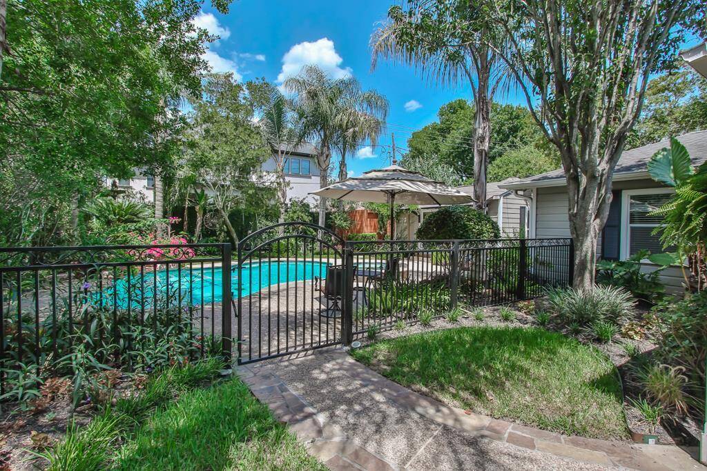 Iron gate encloses the pool.