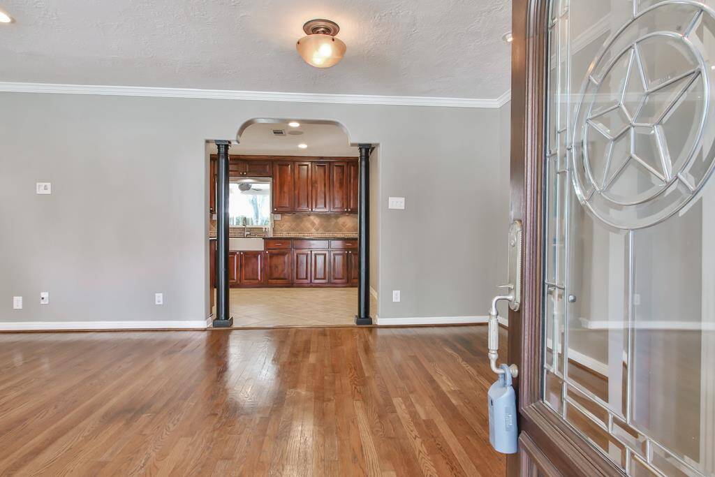 This is the view entering the home through the front door with a view into the kitchen.