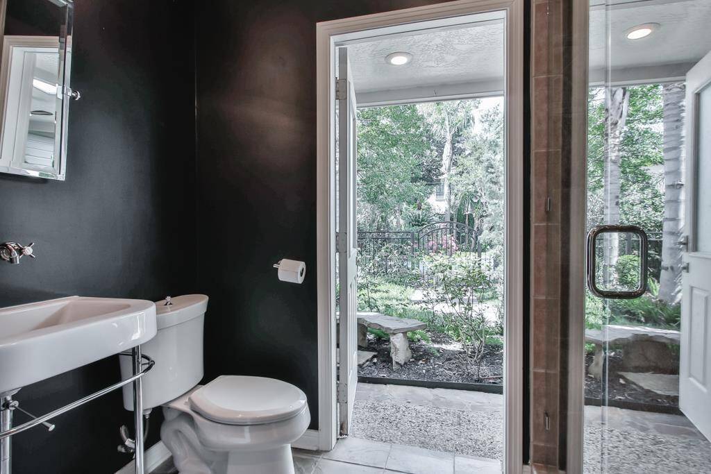 Second bathroom with access to the outside.