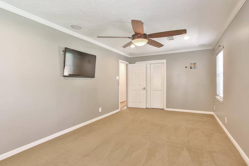 First bedroom No more carpet in this room.  The closet contains the media for the home.  TV is ready for your media inputs.