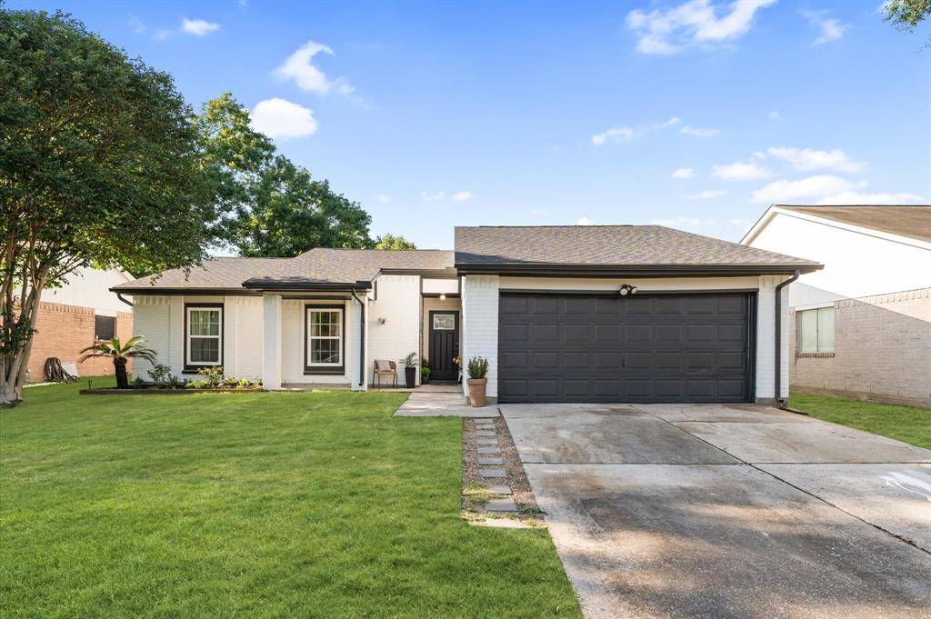 Welcome home! Charming curb appeal with a recently replaced roof and well-maintained exterior.