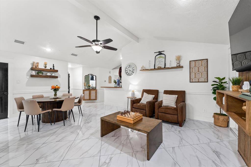 Open concept layout with a cozy living area.
