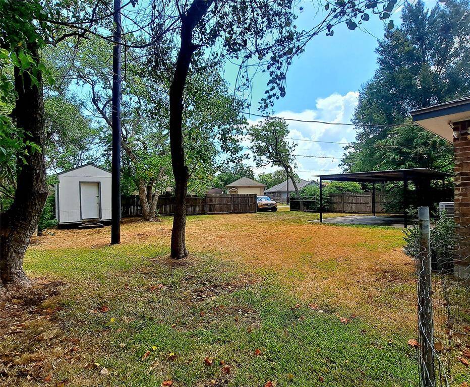 Storage shed and large backyard