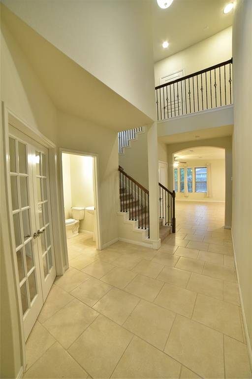 Elevate your living space with high ceilings that enhance openness and flood the area with natural light.
