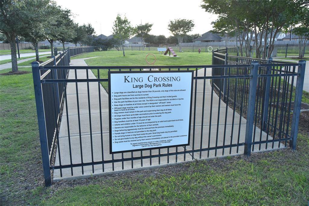 2 dog parks separating small and large dogs