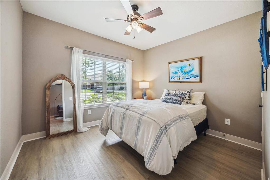 This bedroom offers a warm and welcoming space—perfect for a guest or a full-time resident seeking comfort and privacy.