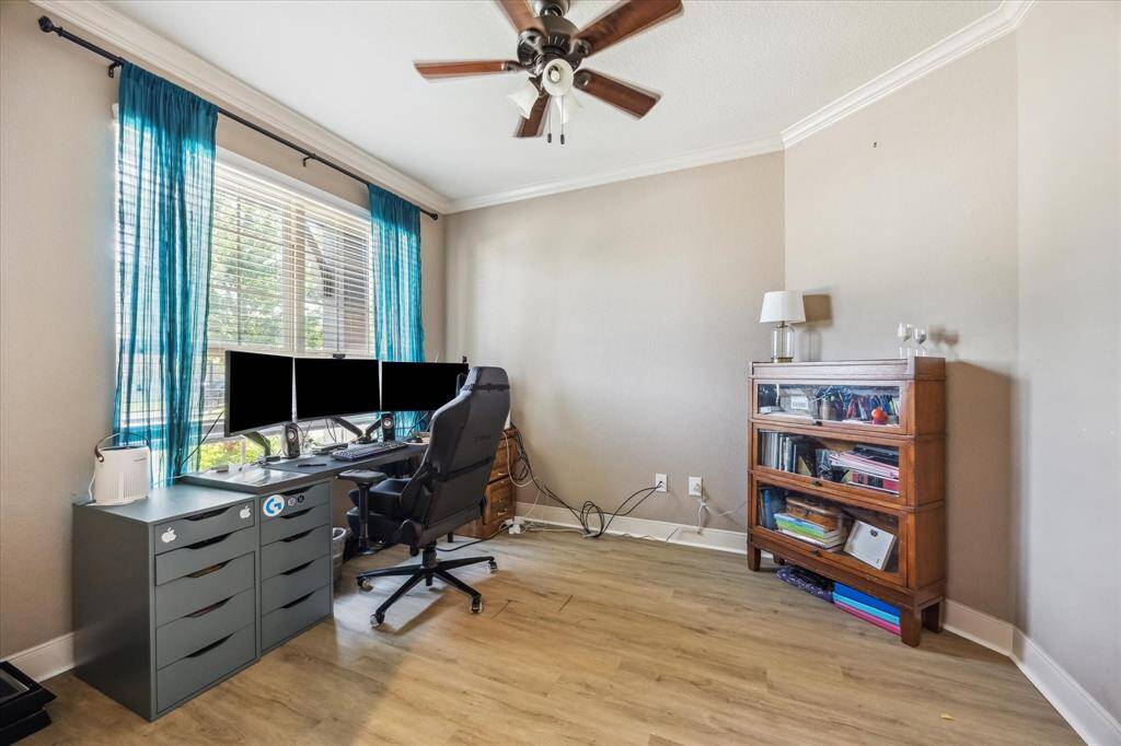 Bright home office with large windows.