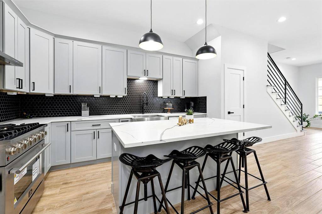 This kitchen is more than just a place to cook-it's a vibrant gathering space that brings everyone together.