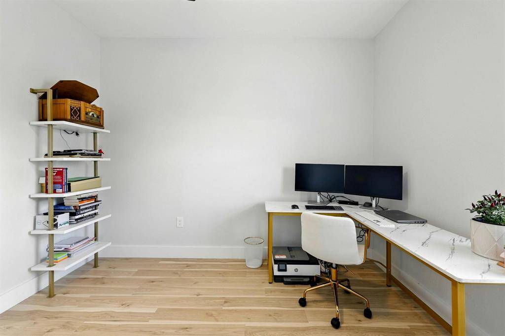 This upstairs bedroom is currently being used as a functional home office, offering a quiet, light filled space perfect for remote work, study, or a project room. With a full closet and ample room for a bed and additional furniture, this room easily transitions back to a third bedroom if desired.
