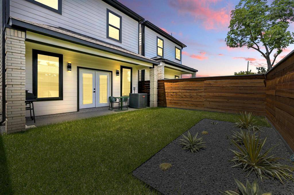 This home offers a clean, minimalist outdoor space that's perfect for low maintenance living.