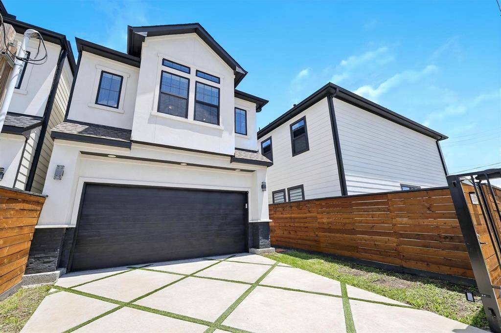 Check out the professionally designed driveway adding curb appeal and functionality.