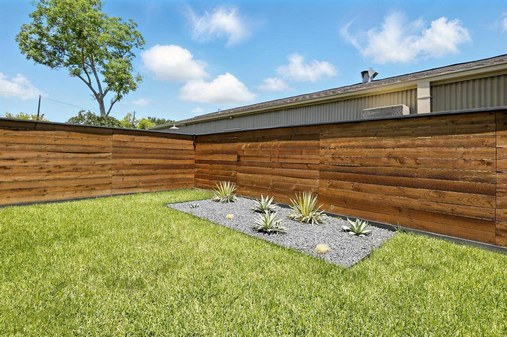 Simple, pet-and family friendly backyard.
