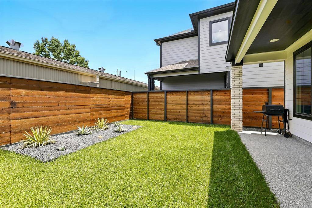 Enjoy added privacy and tranquility in this beautifully designed home, which features no backyard neighbors-a rare and valuable feature in city living.